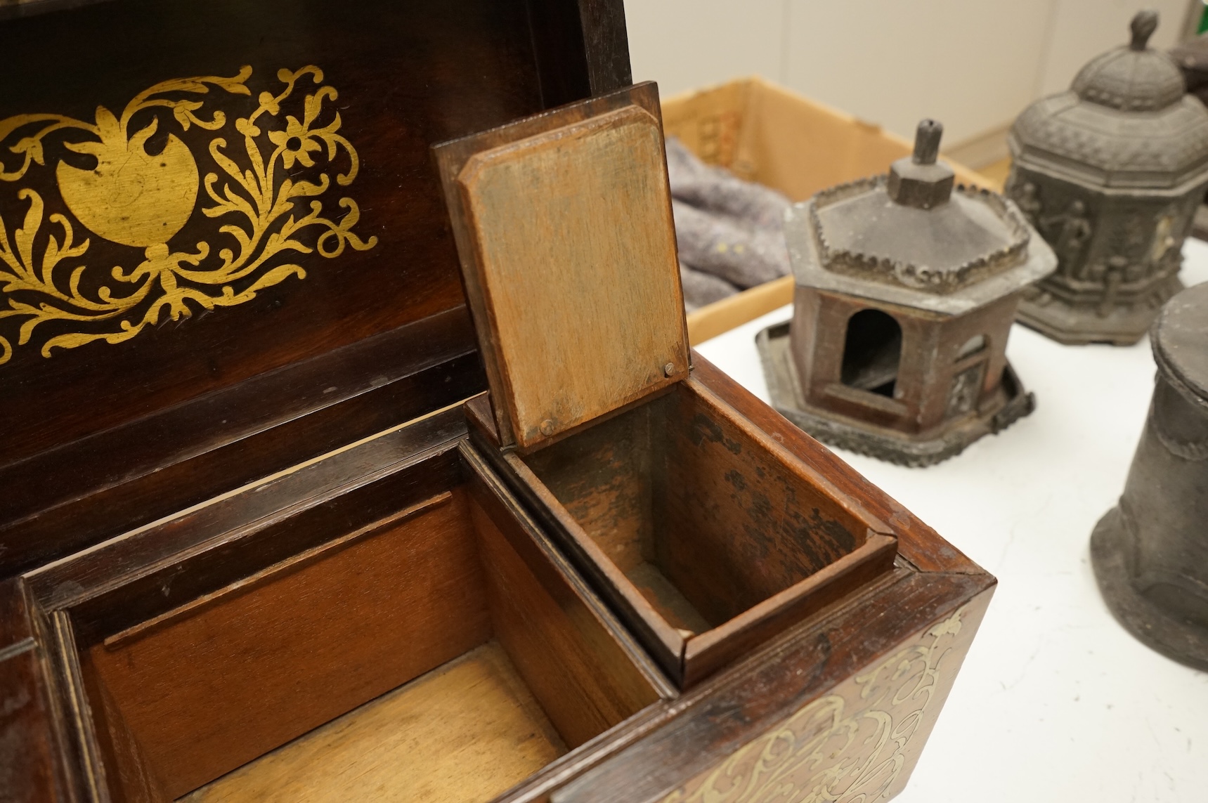 A William IV rosewood and cut brass inlaid tea caddy, 32cm wide